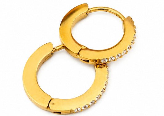 Gold hoop earrings with embedded stones on a white background